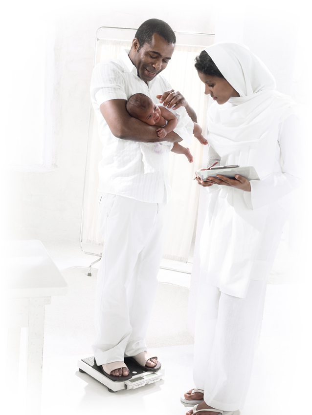 seca 874_healthworker_father_carrying_baby_RGB.jpg